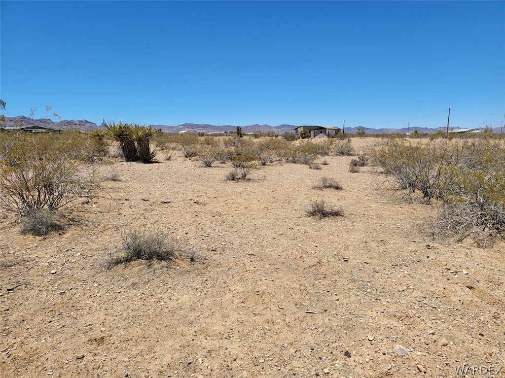 1565 Elgin Road Golden Valley, AZ 86413 - Photo 3 of 6 a view of ocean beach and mountain