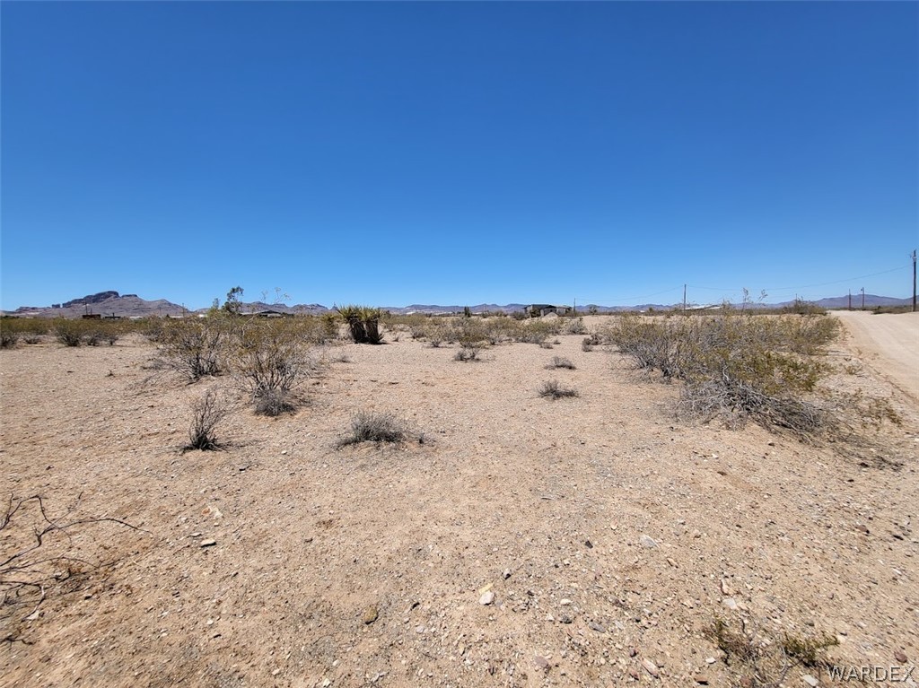 1565 Elgin Road Golden Valley, AZ 86413 - Photo 4 of 6 a view of beach and mountain
