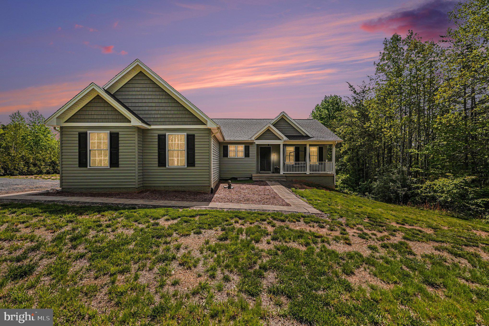 8474 Timothy Lane Rixeyville, VA 22737 - Photo 2 of 49 front view of a house with a yard