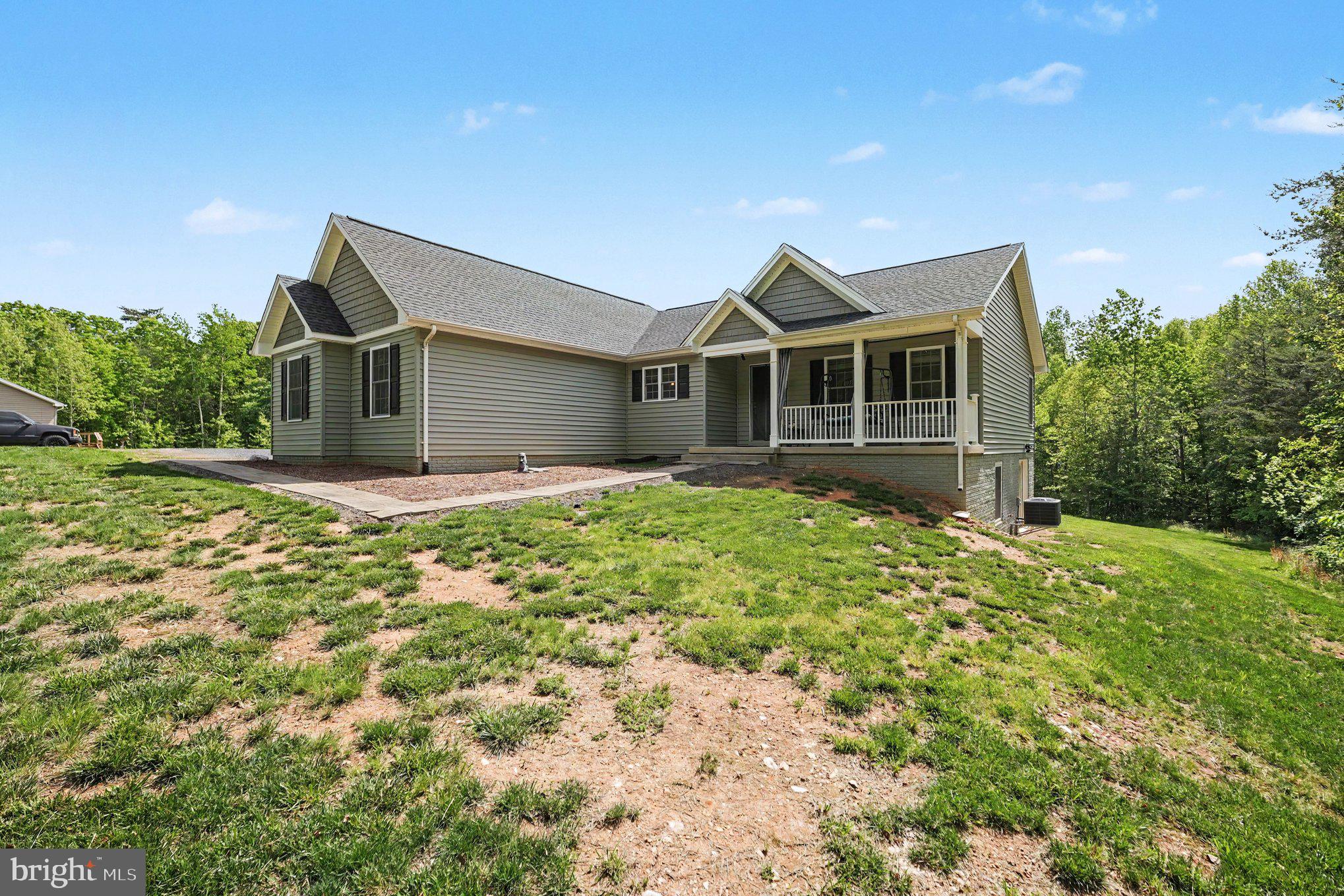 8474 Timothy Lane Rixeyville, VA 22737 - Photo 3 of 49 a front view of house with yard and green space