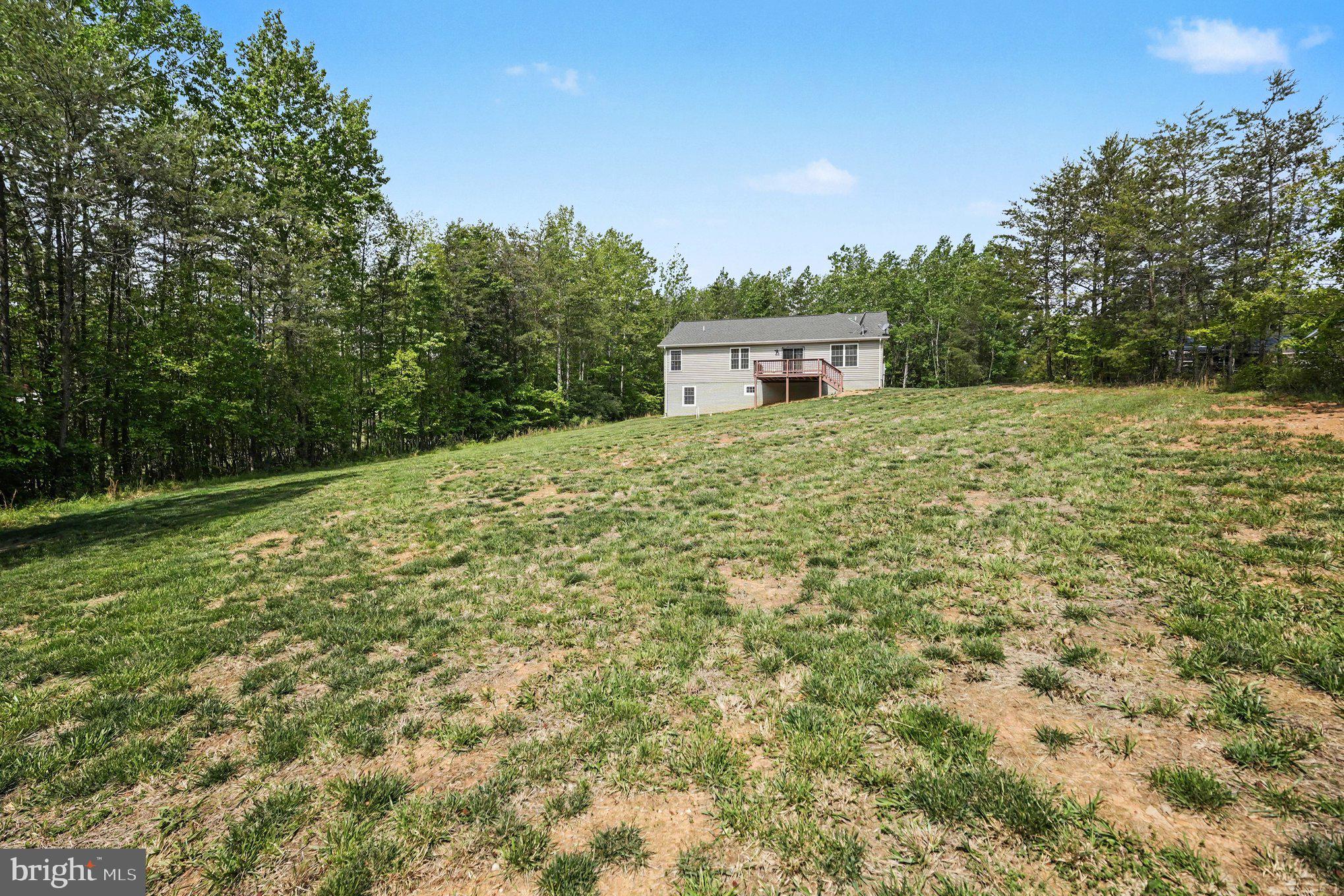 8474 Timothy Lane Rixeyville, VA 22737 - Photo 34 of 49 a view of a tiny house with a yard