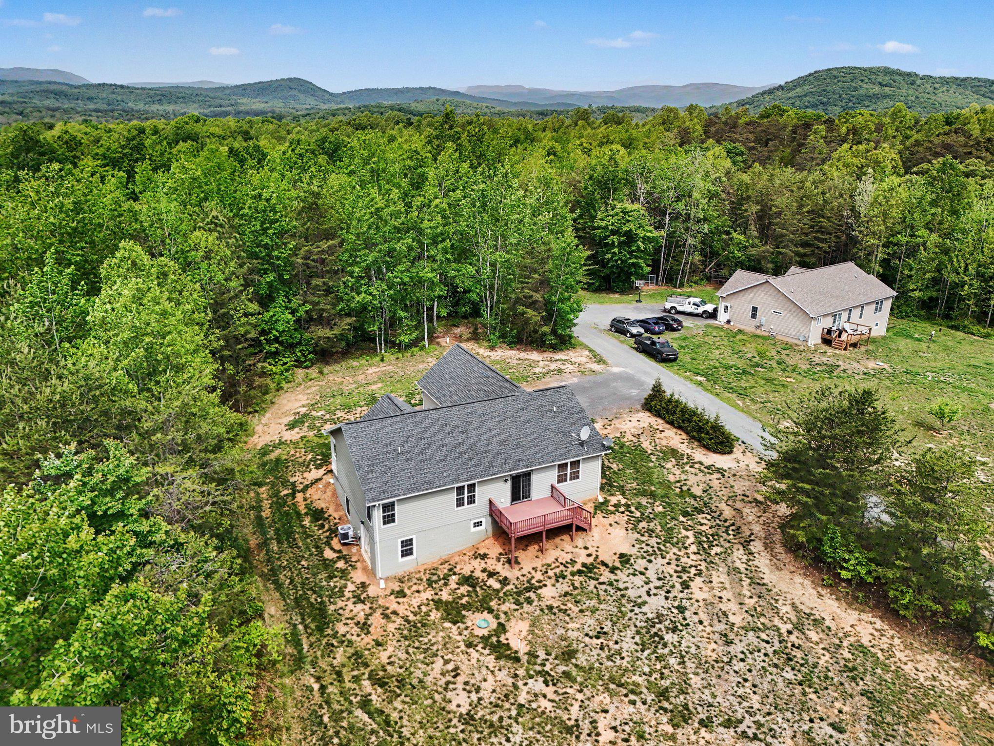8474 Timothy Lane Rixeyville, VA 22737 - Photo 40 of 49 aerial view of a house with a garden