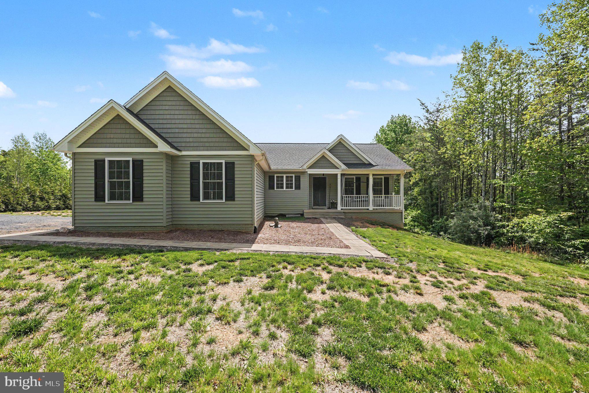 8474 Timothy Lane Rixeyville, VA 22737 - Photo 4 of 49 front view of a house with a yard