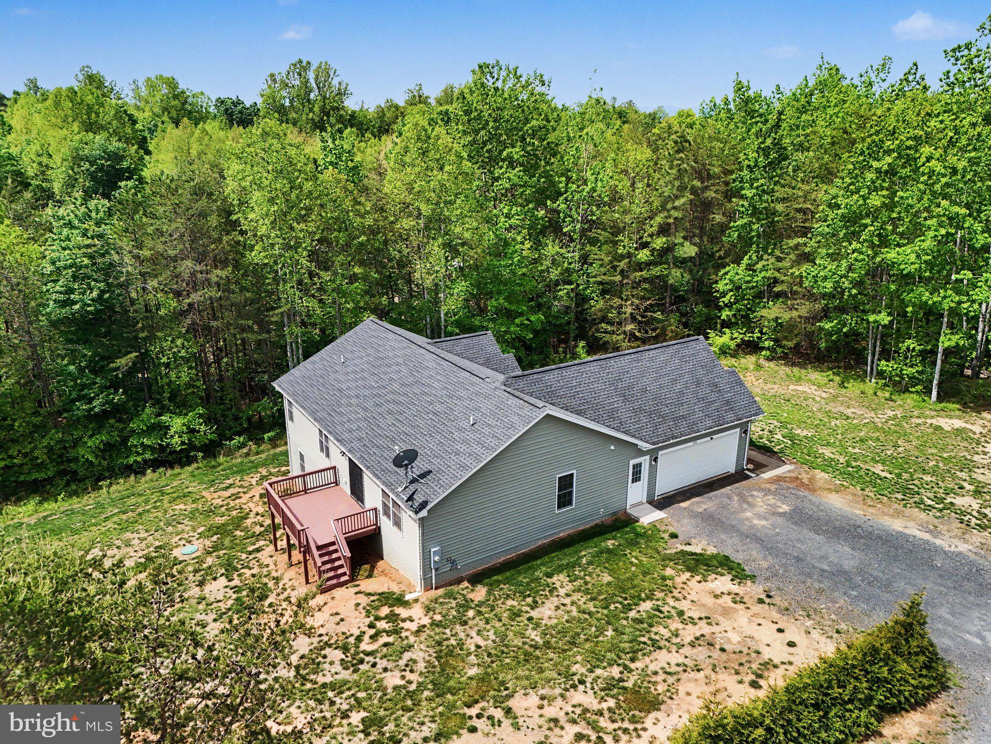 8474 Timothy Lane Rixeyville, VA 22737 - Photo 44 of 49 an aerial view of a house with yard and outdoor seating