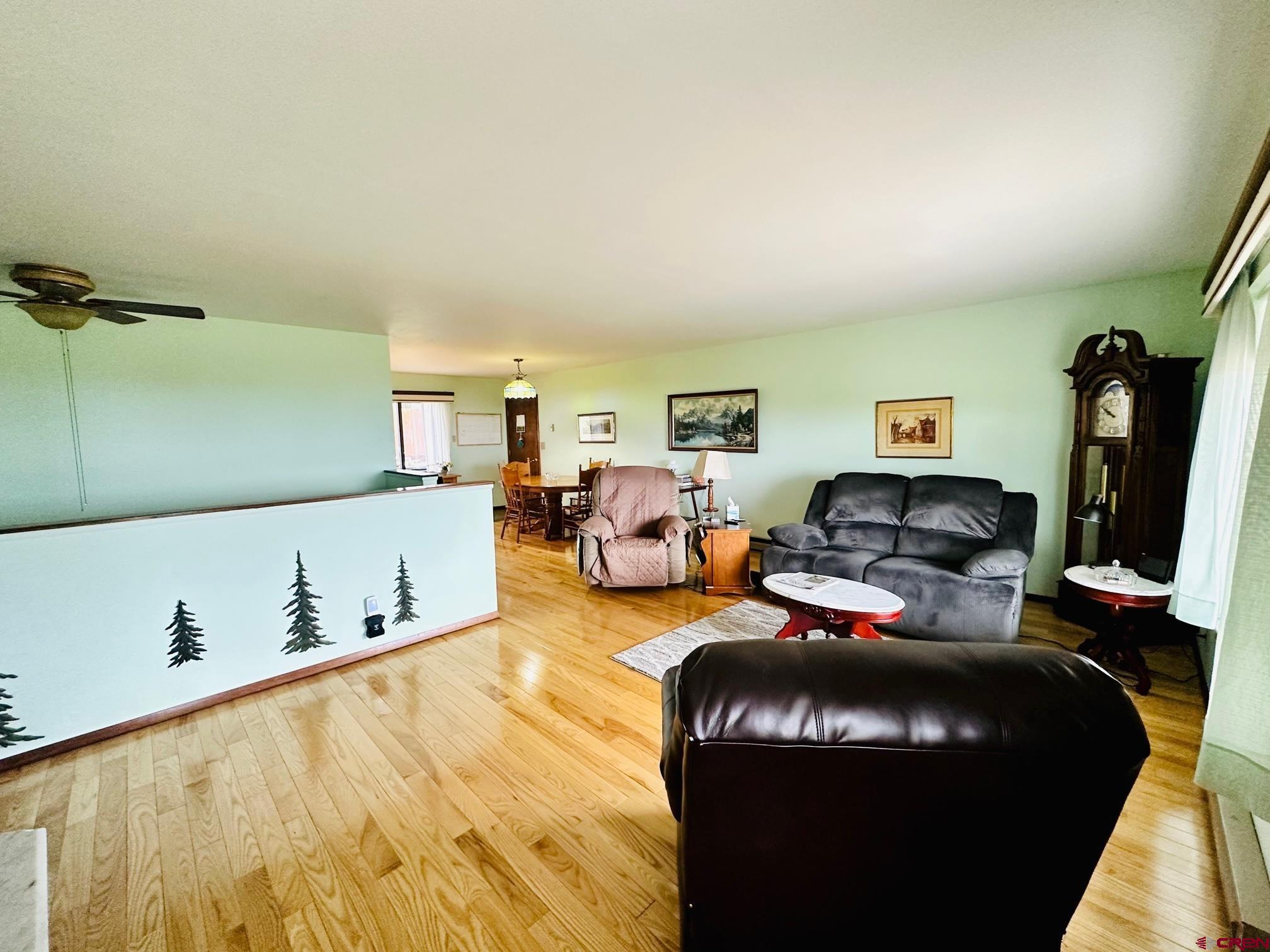 18574 Eastridge Road Cedaredge, CO 81413 - Photo 9 of 20 a living room with furniture