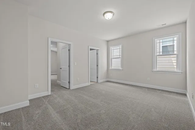 an empty room with window