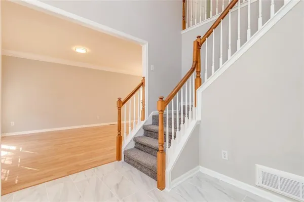 a view of entryway with wooden floor