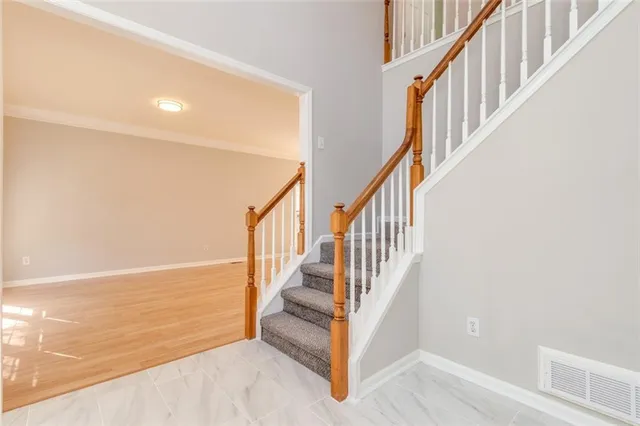 a view of entryway with wooden floor