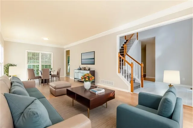 a living room with furniture or couch and a window