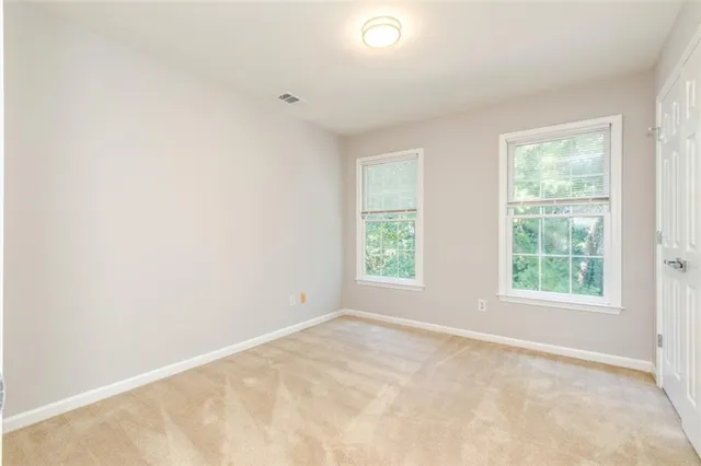 an empty room with windows