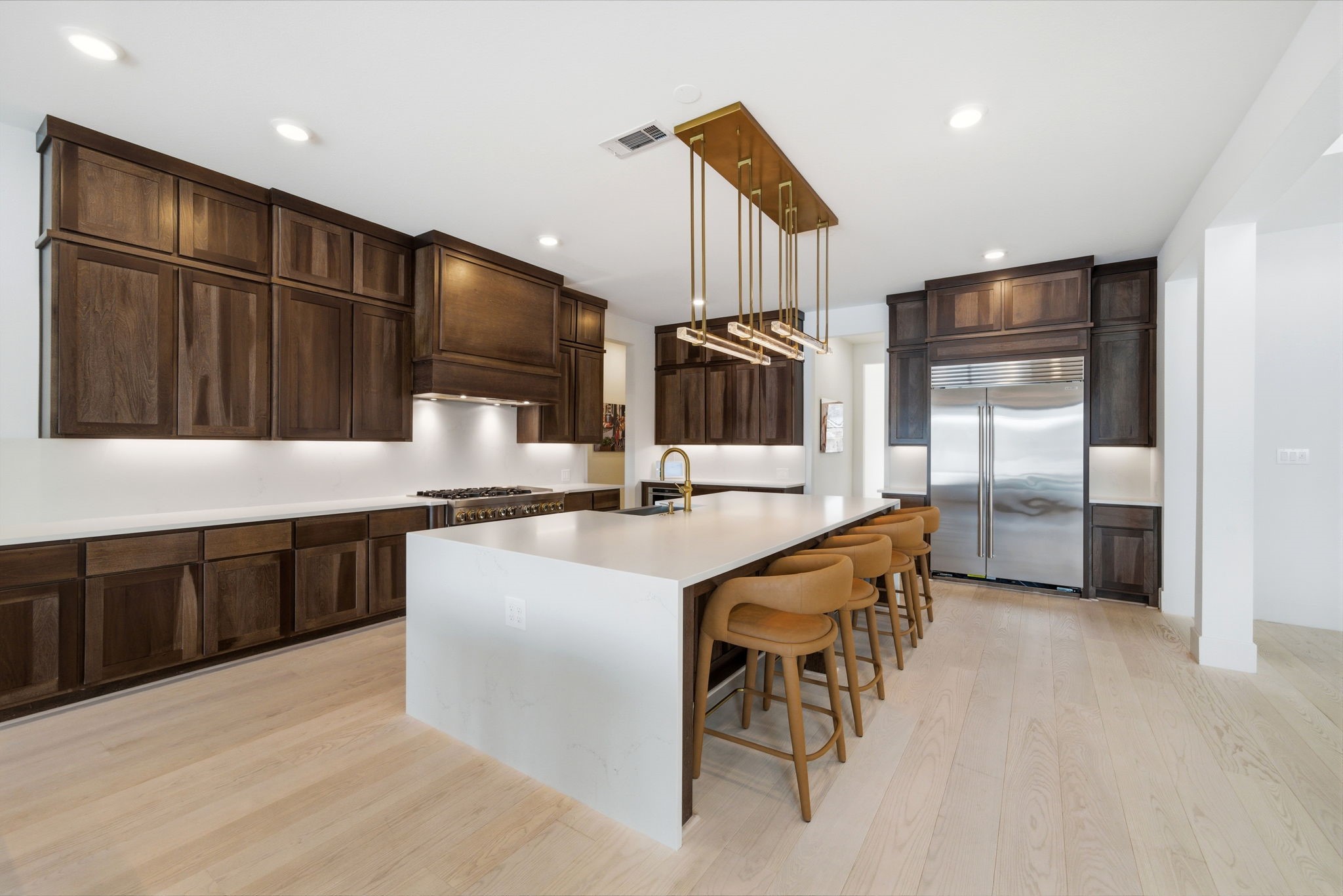 4906 Lagos Lagoon Way Spring, TX 77389 - Photo 16 of 48 Chef’s kitchen with waterfall island and high-end appliances