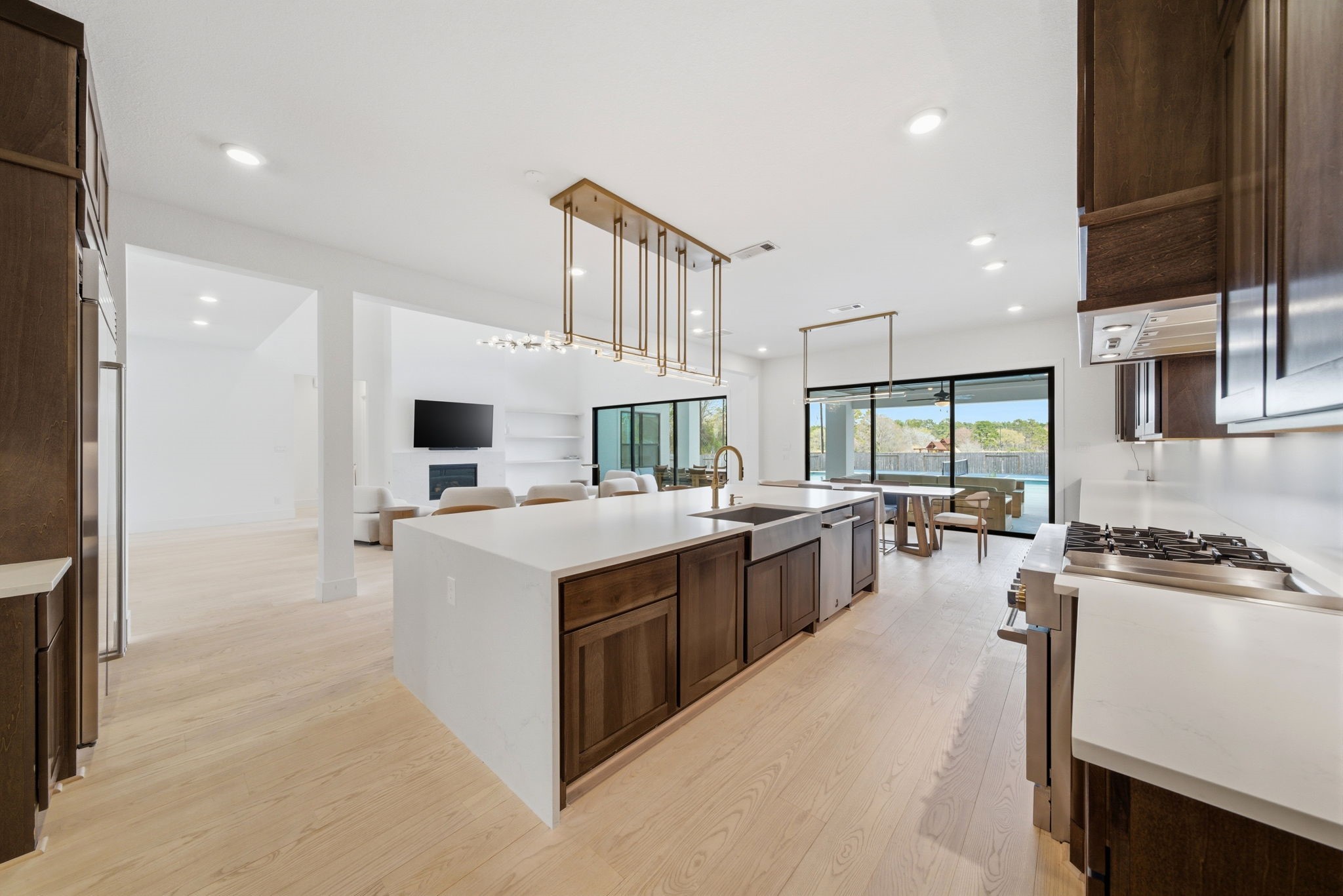 4906 Lagos Lagoon Way Spring, TX 77389 - Photo 17 of 48 Contemporary kitchen featuring premium appliances and minimalist design.