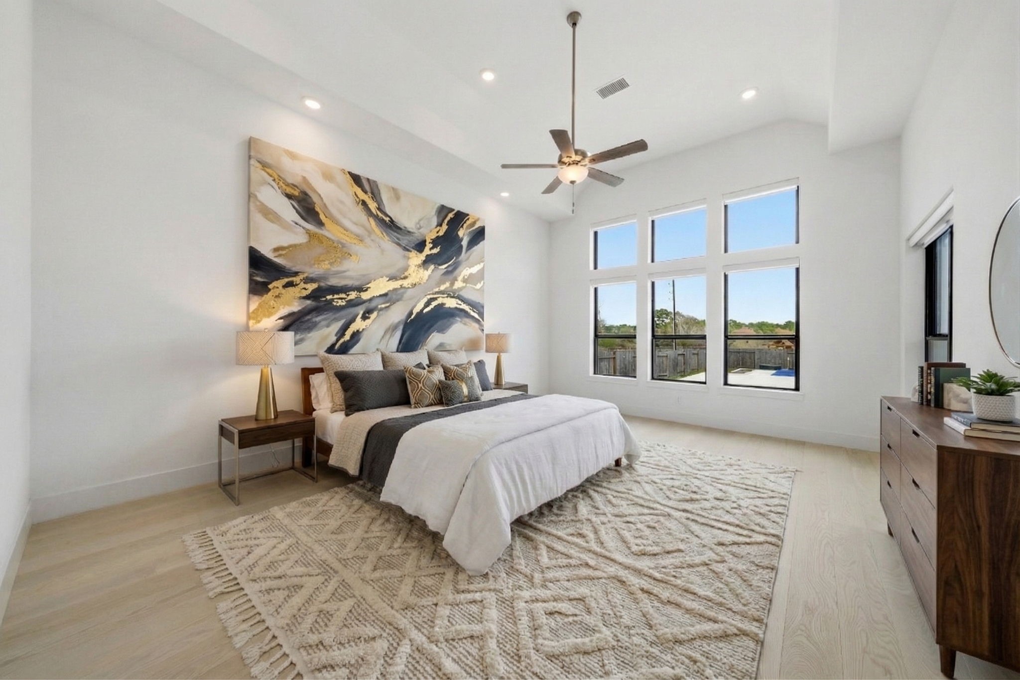 4906 Lagos Lagoon Way Spring, TX 77389 - Photo 25 of 48 Light-filled primary bedroom with contemporary elegance