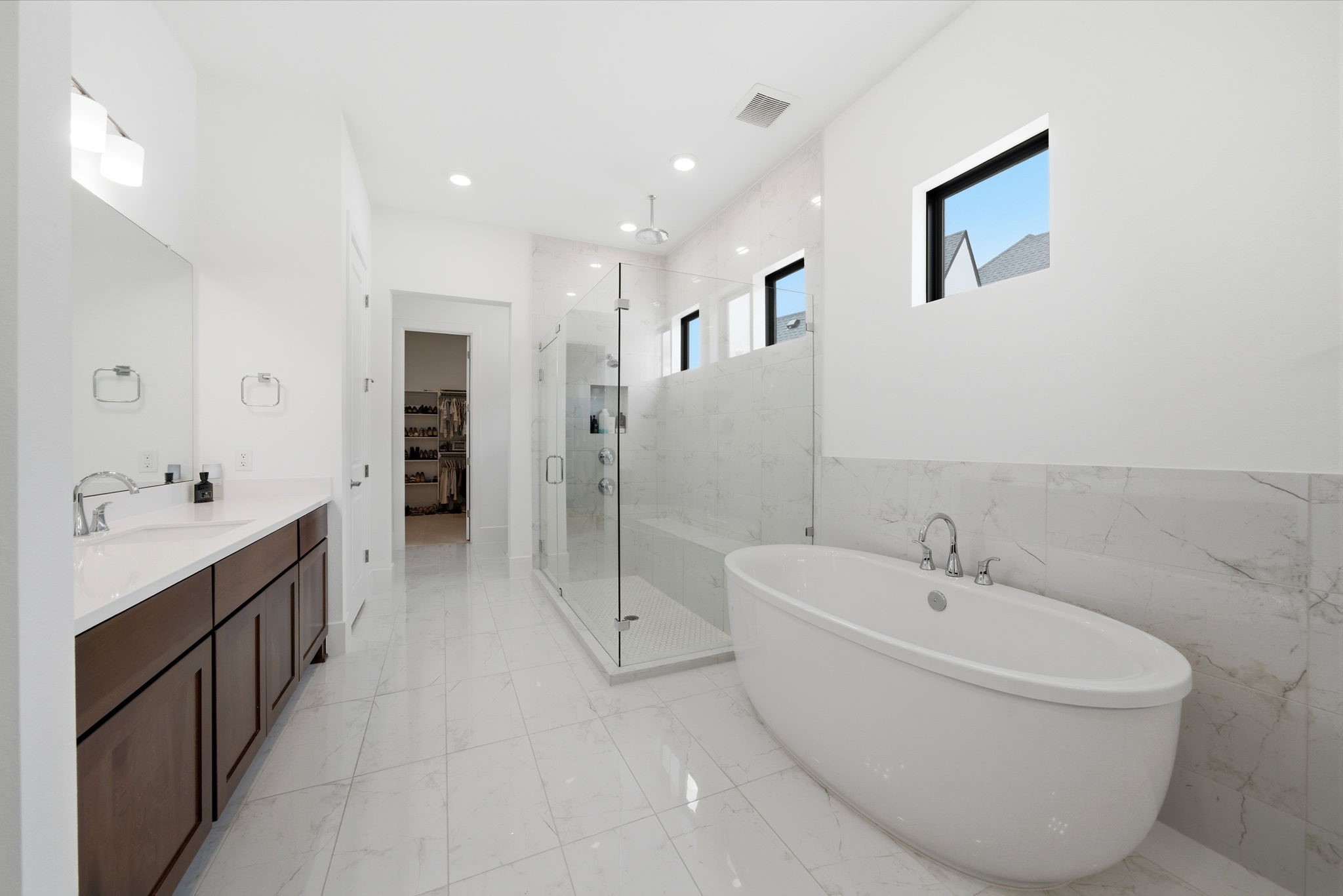 4906 Lagos Lagoon Way Spring, TX 77389 - Photo 26 of 48 Spa-inspired bath with freestanding soaking tub and glass shower