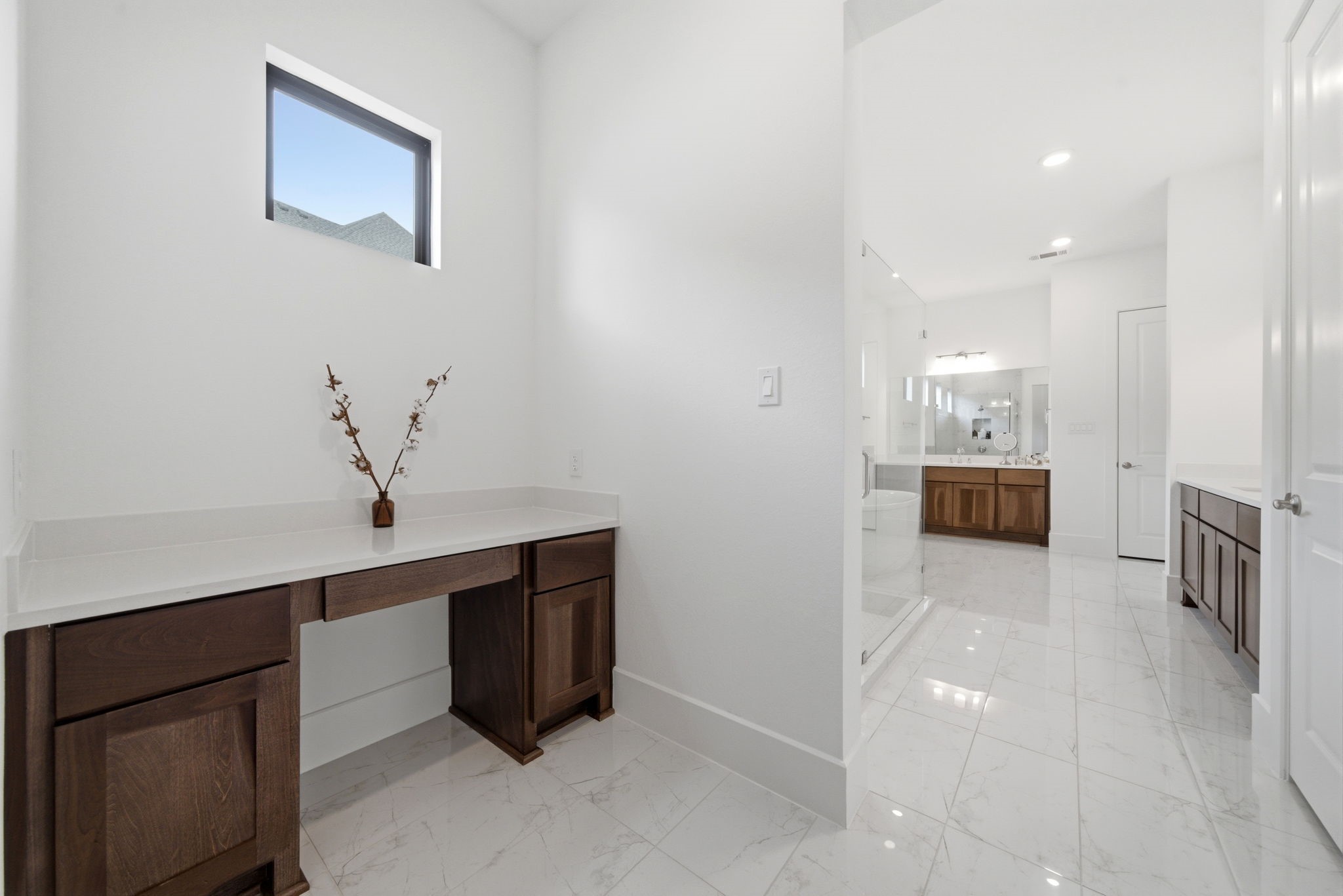 4906 Lagos Lagoon Way Spring, TX 77389 - Photo 28 of 48 Modern primary bath featuring a dedicated vanity nook with storage
