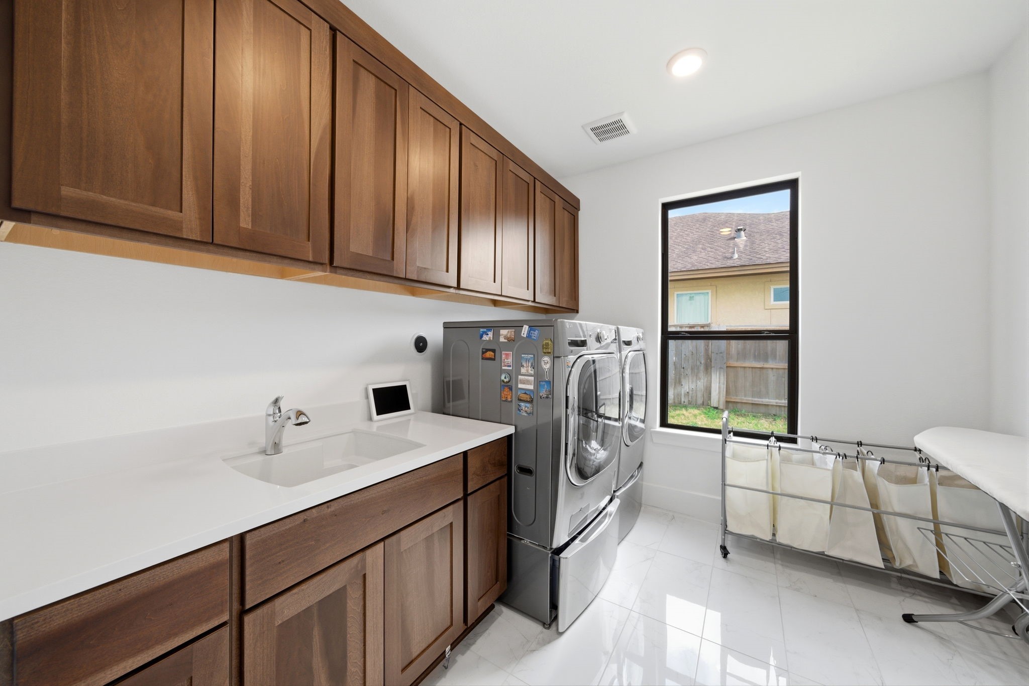 4906 Lagos Lagoon Way Spring, TX 77389 - Photo 30 of 48 Spacious utility room with ample storage and countertop workspace