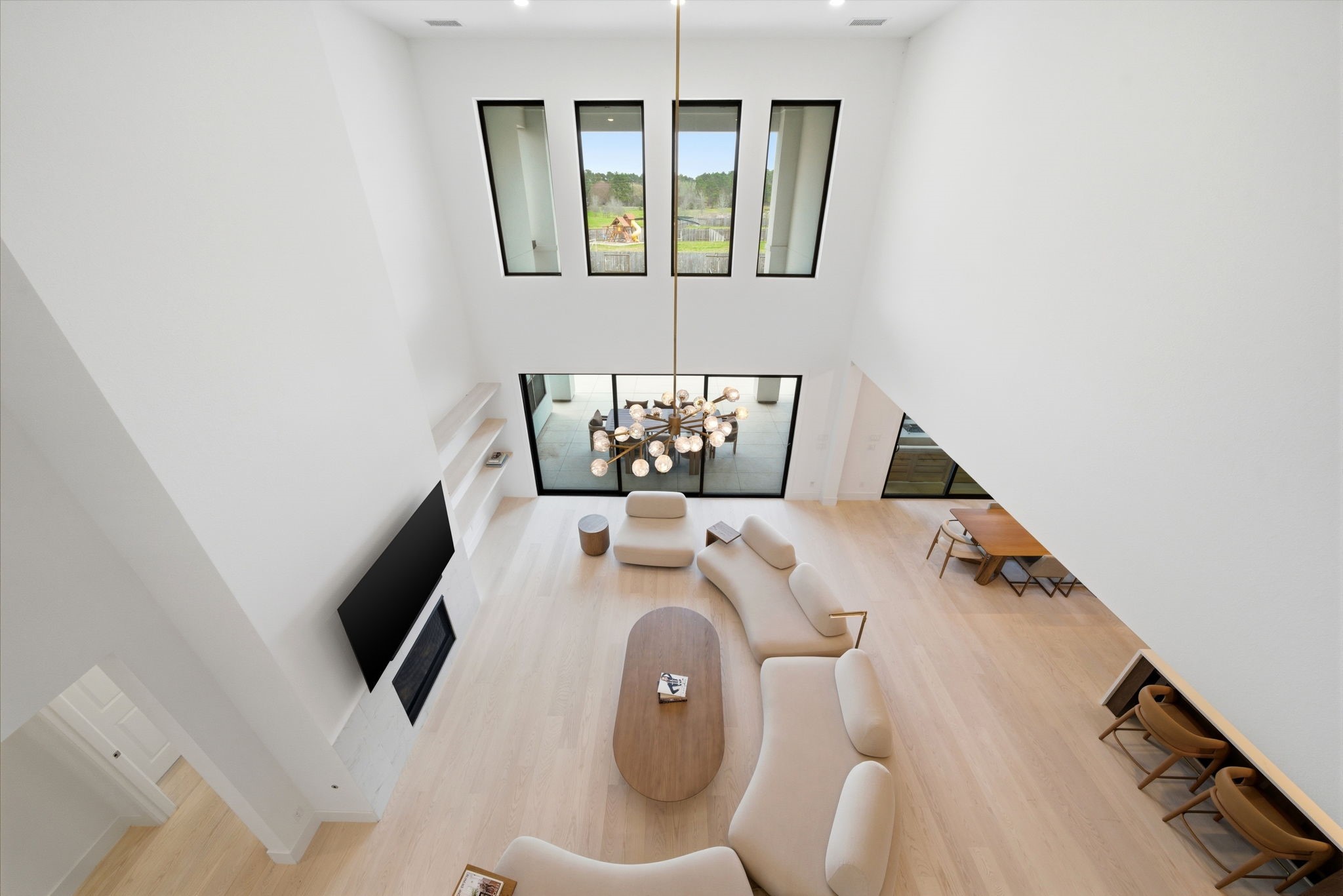 4906 Lagos Lagoon Way Spring, TX 77389 - Photo 31 of 48 View from second floor. Elegant living area with seamless indoor-outdoor flow.