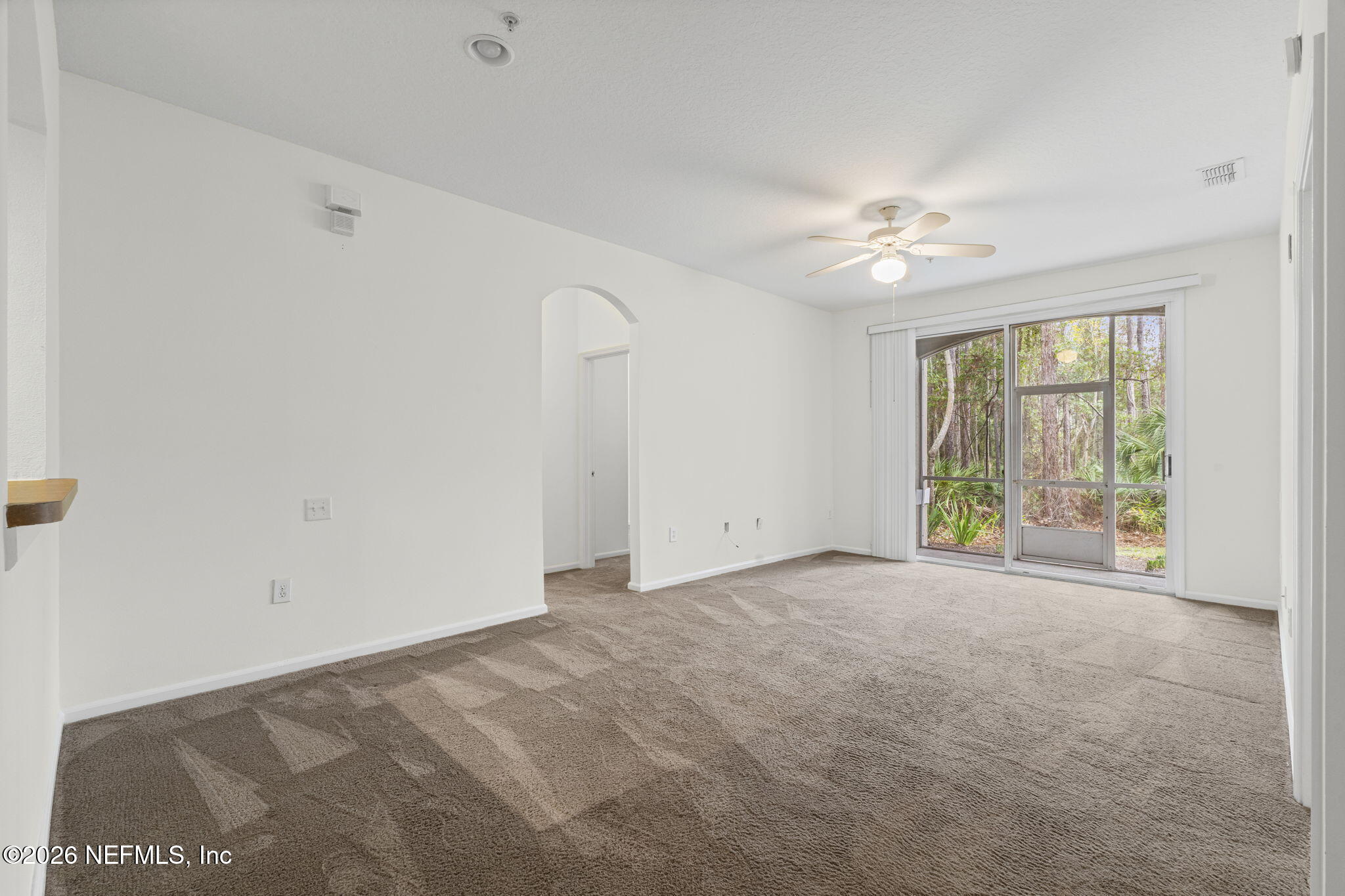 10550 Baymeadows Road, Unit 601 Jacksonville, FL 32256 - Photo 20 of 37 a view of an empty room with a window