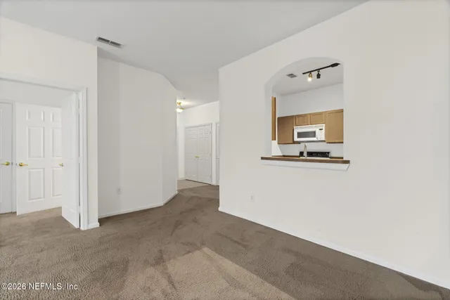 a view of a house with a large window