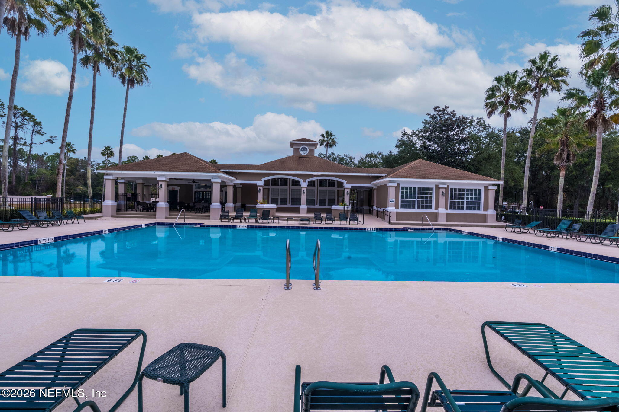 10550 Baymeadows Road, Unit 601 Jacksonville, FL 32256 - Photo 34 of 37 a view of a house with a swimming pool