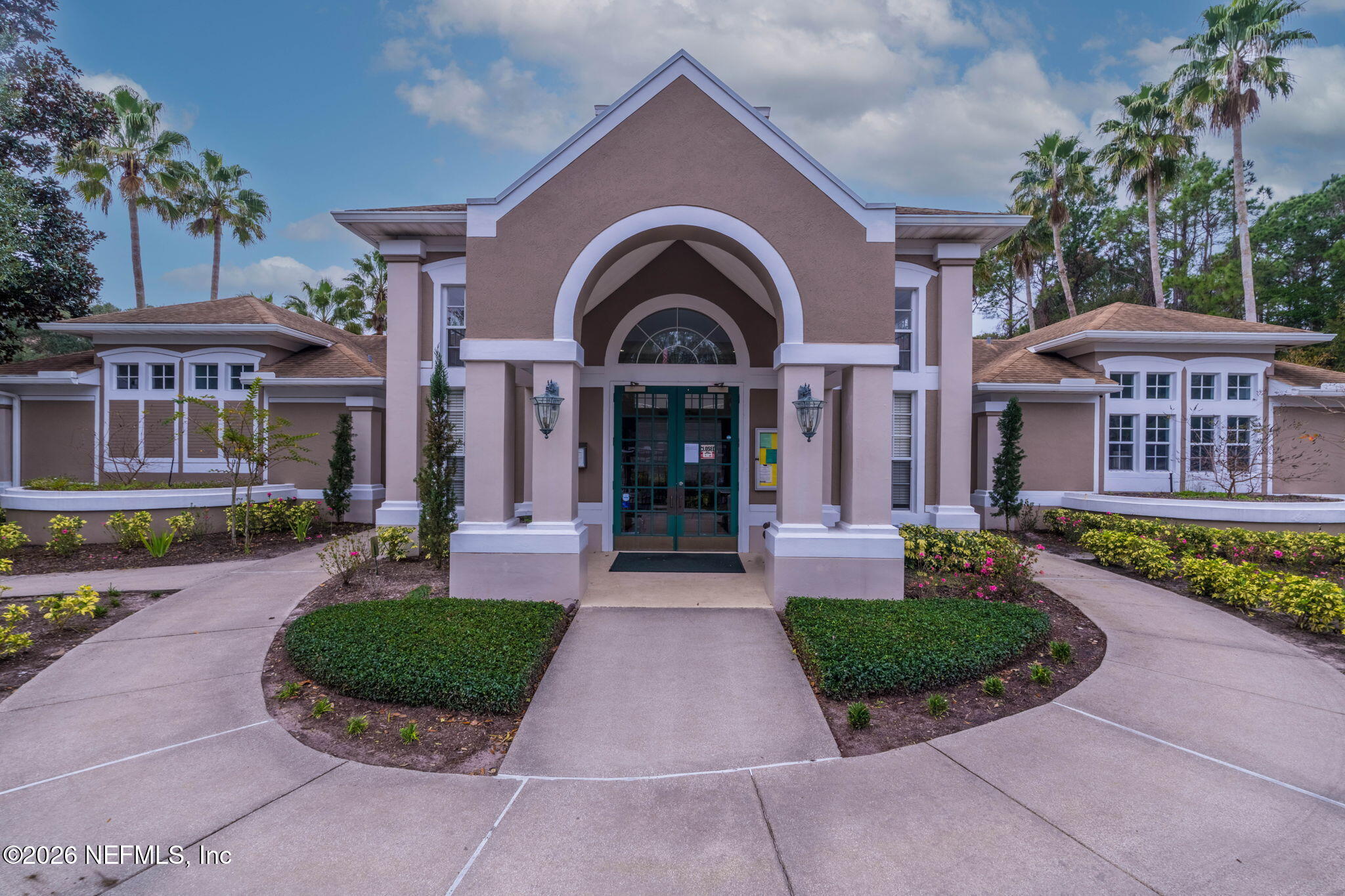 10550 Baymeadows Road, Unit 601 Jacksonville, FL 32256 - Photo 35 of 37 front view of a brick house with a yard