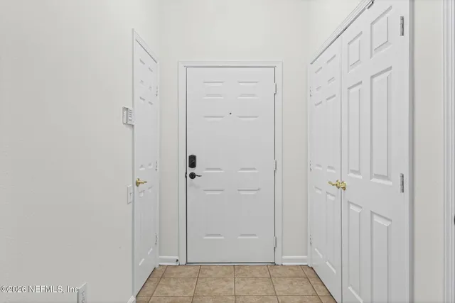 a view of bathroom with washer and dryer