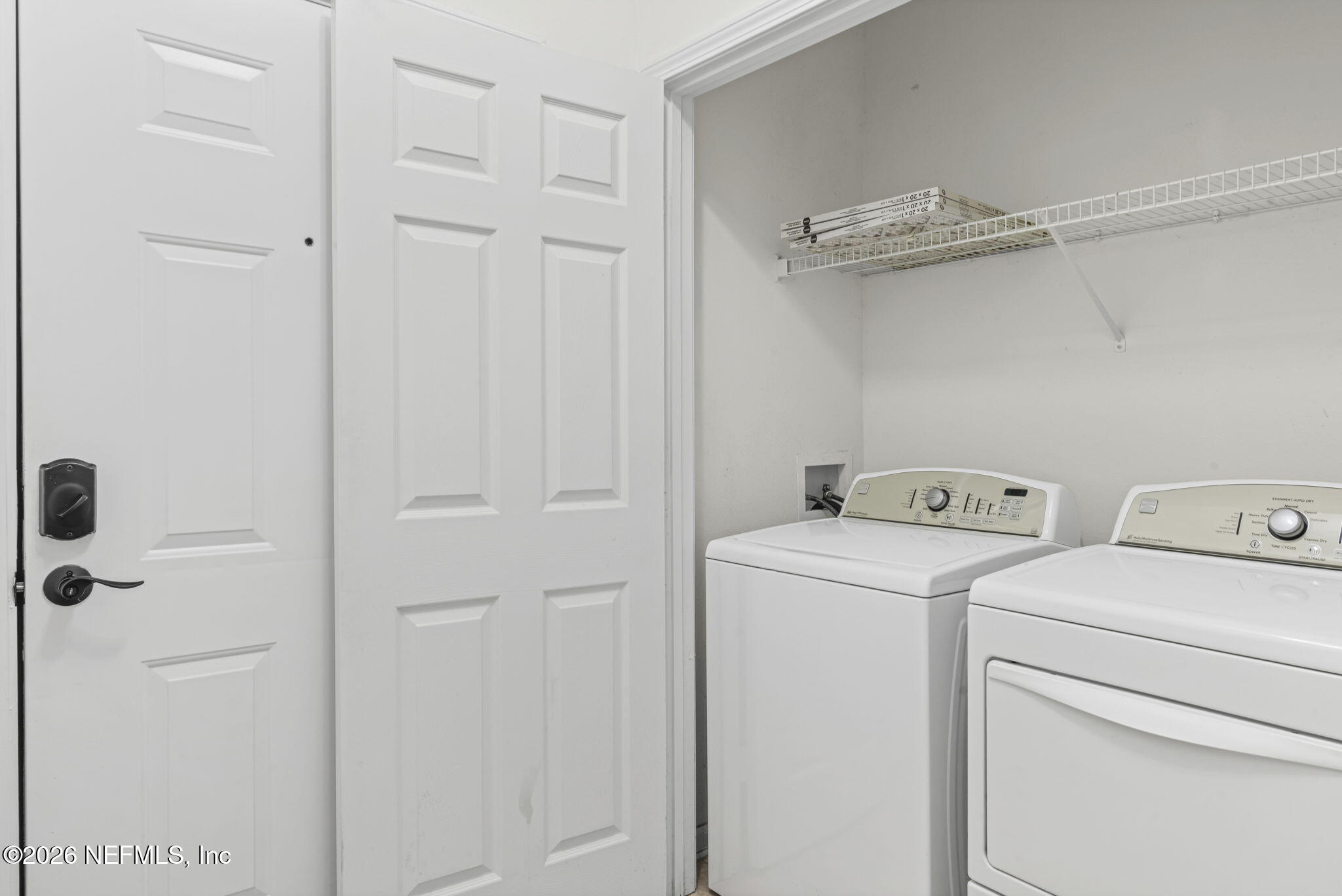 10550 Baymeadows Road, Unit 601 Jacksonville, FL 32256 - Photo 5 of 37 a view of bathroom with washer and dryer