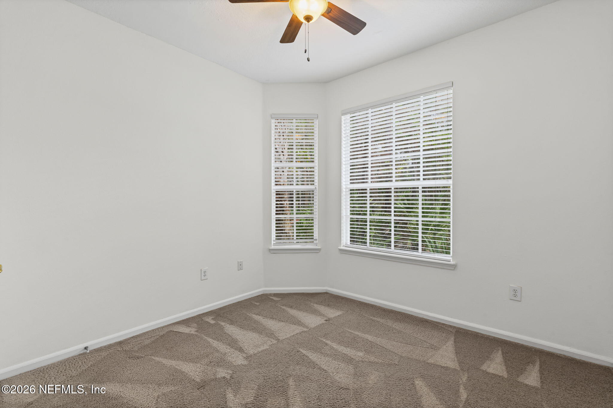 10550 Baymeadows Road, Unit 601 Jacksonville, FL 32256 - Photo 10 of 37 an empty room with a window