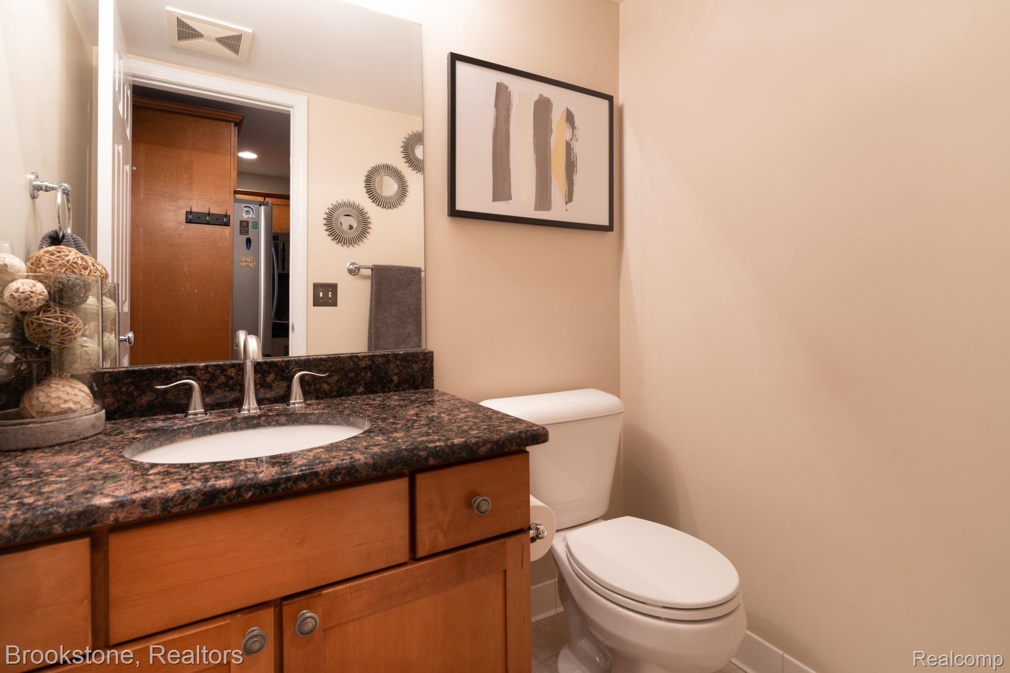7284 Rabbit Ears Pass Clarkston, MI 48346 - Photo 19 of 39 half bath with granite