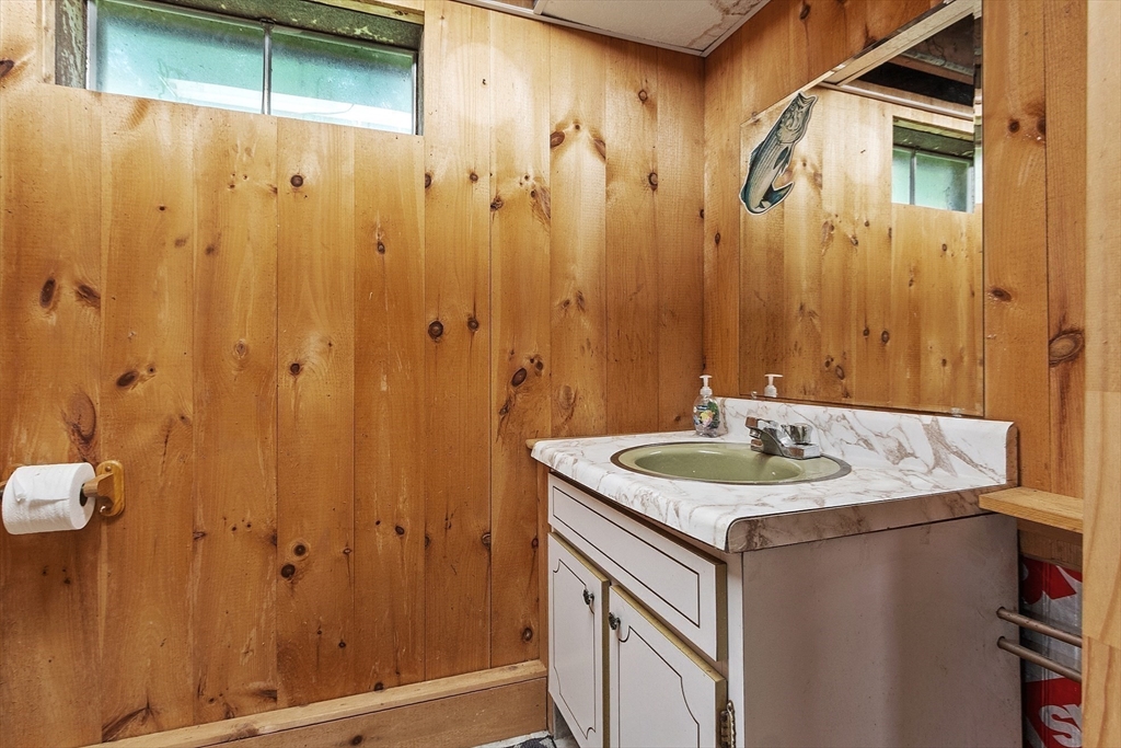 87 Hubbardston Road Templeton, MA 01468 - Photo 25 of 42 a bathroom with a sink and a mirror