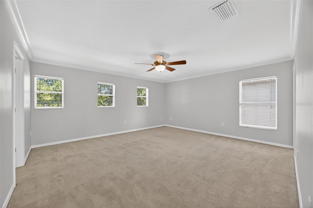 6611 Gates Pointe Way Riverview, FL 33578 - Photo 15 of 55 a view of an empty room with a window