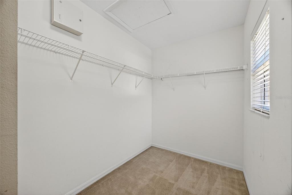 6611 Gates Pointe Way Riverview, FL 33578 - Photo 17 of 55 a view of a room with racks on the wall