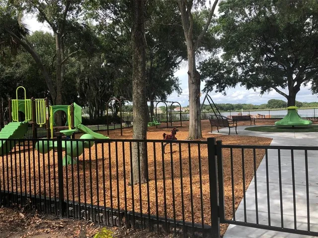 a park bench sitting in the middle of a park