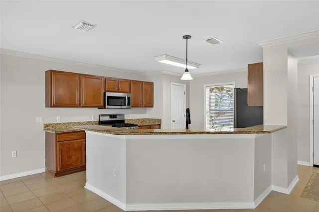a bathroom with a sink vanity and mirror
