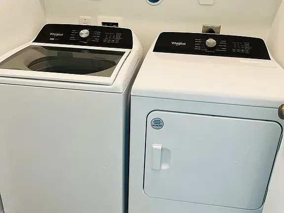 a close up view of washer and dryer