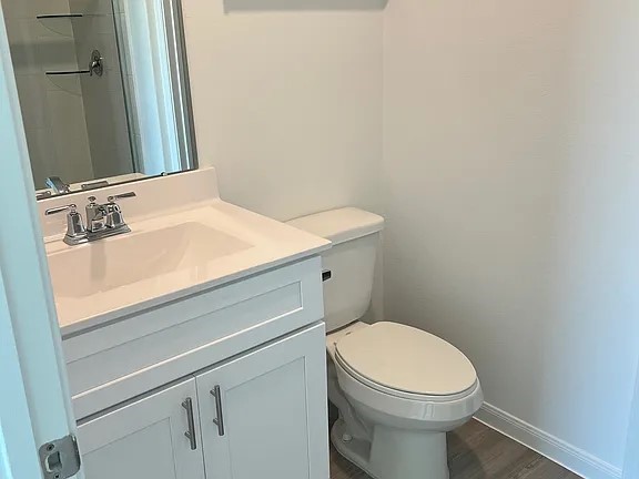 23422 Weir Box Road Hockley, TX 77447 - Photo 8 of 14 a bathroom with a sink and a toilet