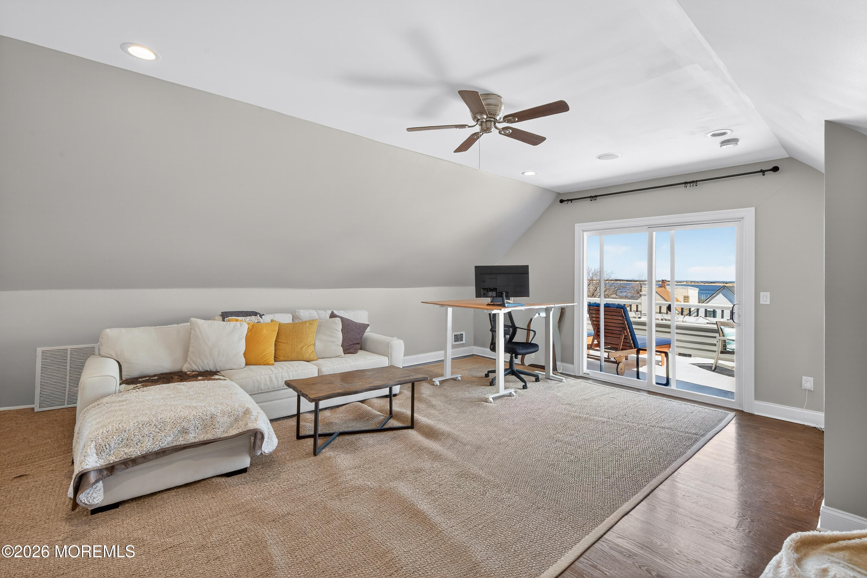 27 5th Street Highlands, NJ 07732 - Photo 32 of 62 a living room with furniture and a table