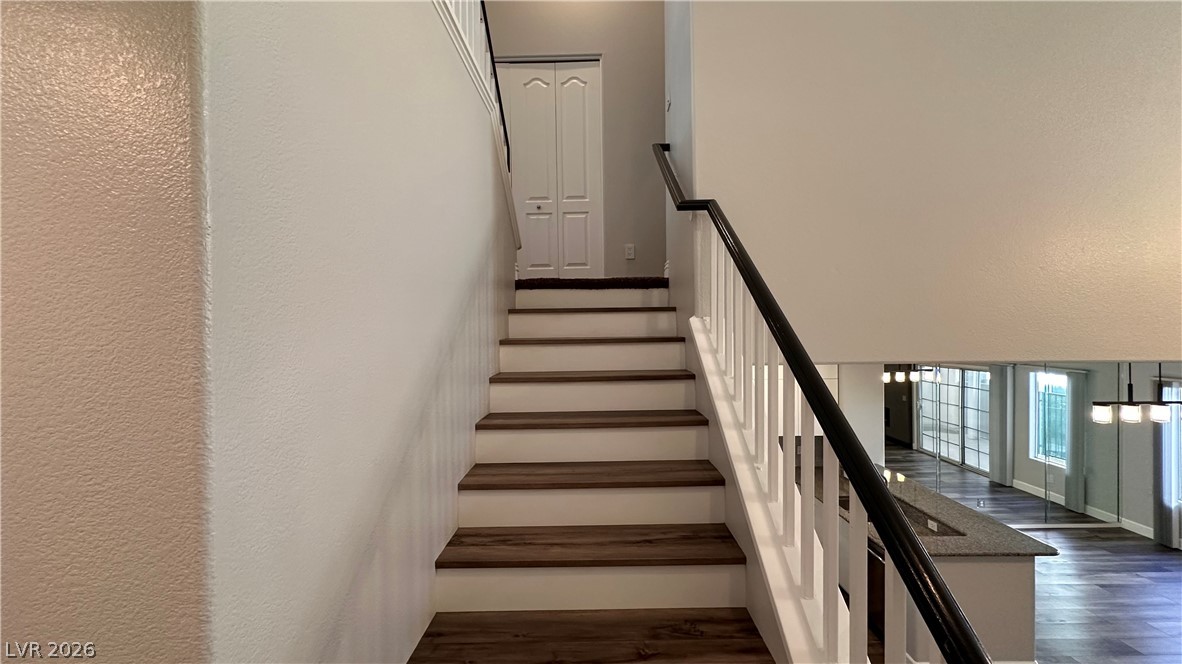 5268 Island Chain Road Las Vegas, NV 89118 - Photo 21 of 52 Stairs to bedrooms, loft and laundry