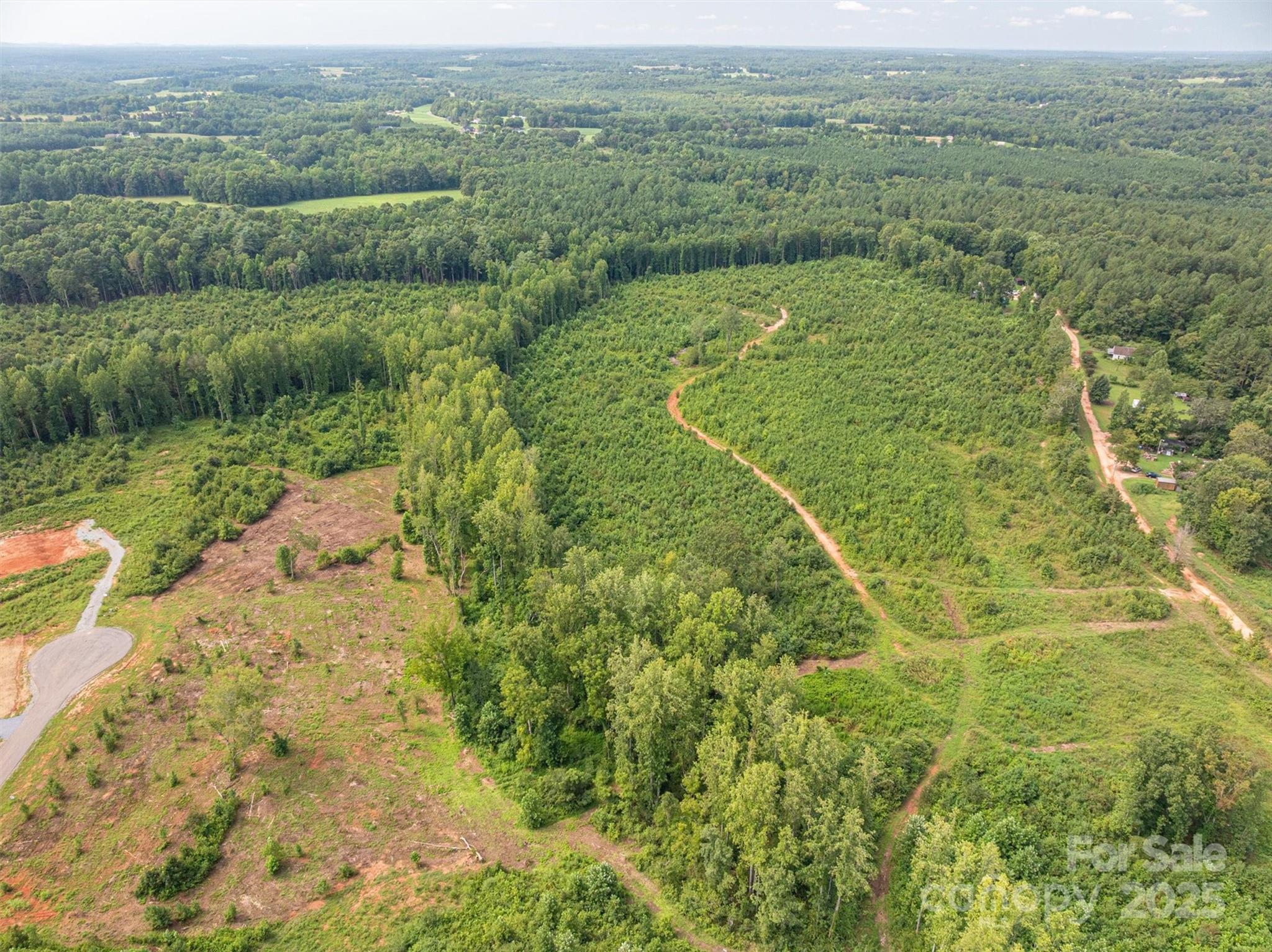 0 Westwinds Road, Unit F3 Lincolnton, NC 28092 - Photo 11 of 13 a view of a big yard with lots of green space and mountain view in back