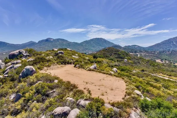a view of an outdoor space with mountain view