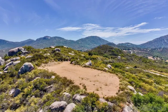 a view of an outdoor space with mountain view