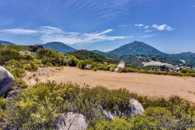 a view of lake with mountain