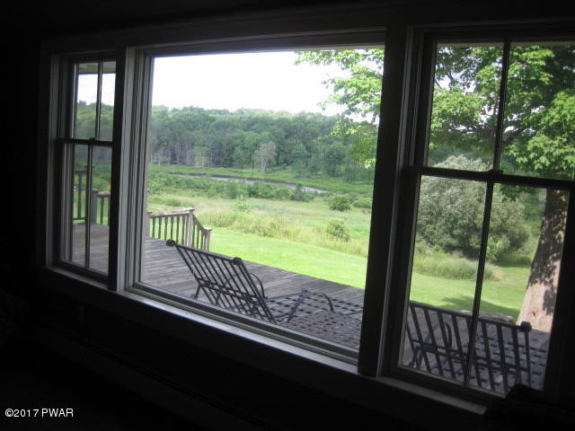 72 Valley Ridge Road Honesdale, PA 18431 - Photo 29 of 72 15A VIEW OF POND FROM LIVING ROOM