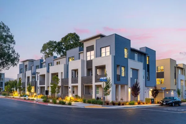 a view of a building with a street