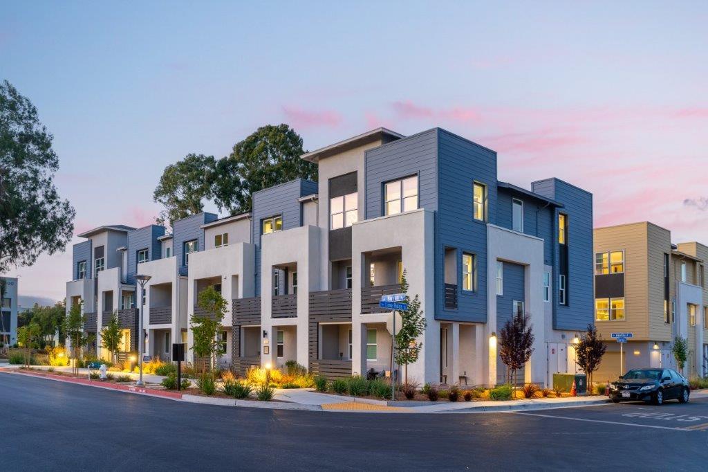 a view of a building with a street