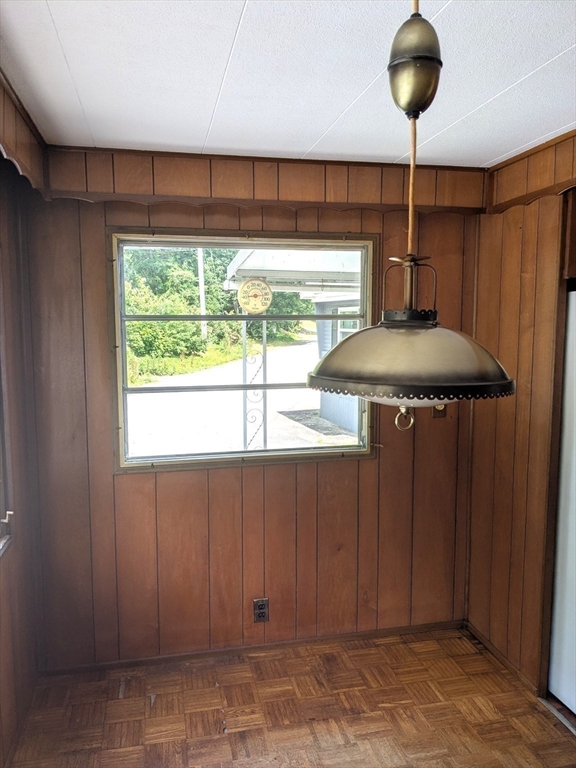 83 Clark Road, Unit 38 Shirley, MA 01464 - Photo 13 of 24 a kitchen with a window and cabinets
