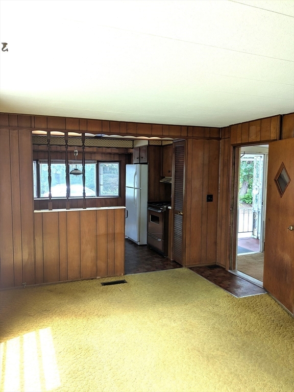 83 Clark Road, Unit 38 Shirley, MA 01464 - Photo 7 of 24 an empty room with windows