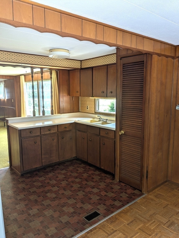 83 Clark Road, Unit 38 Shirley, MA 01464 - Photo 10 of 24 a kitchen with a sink and cabinets