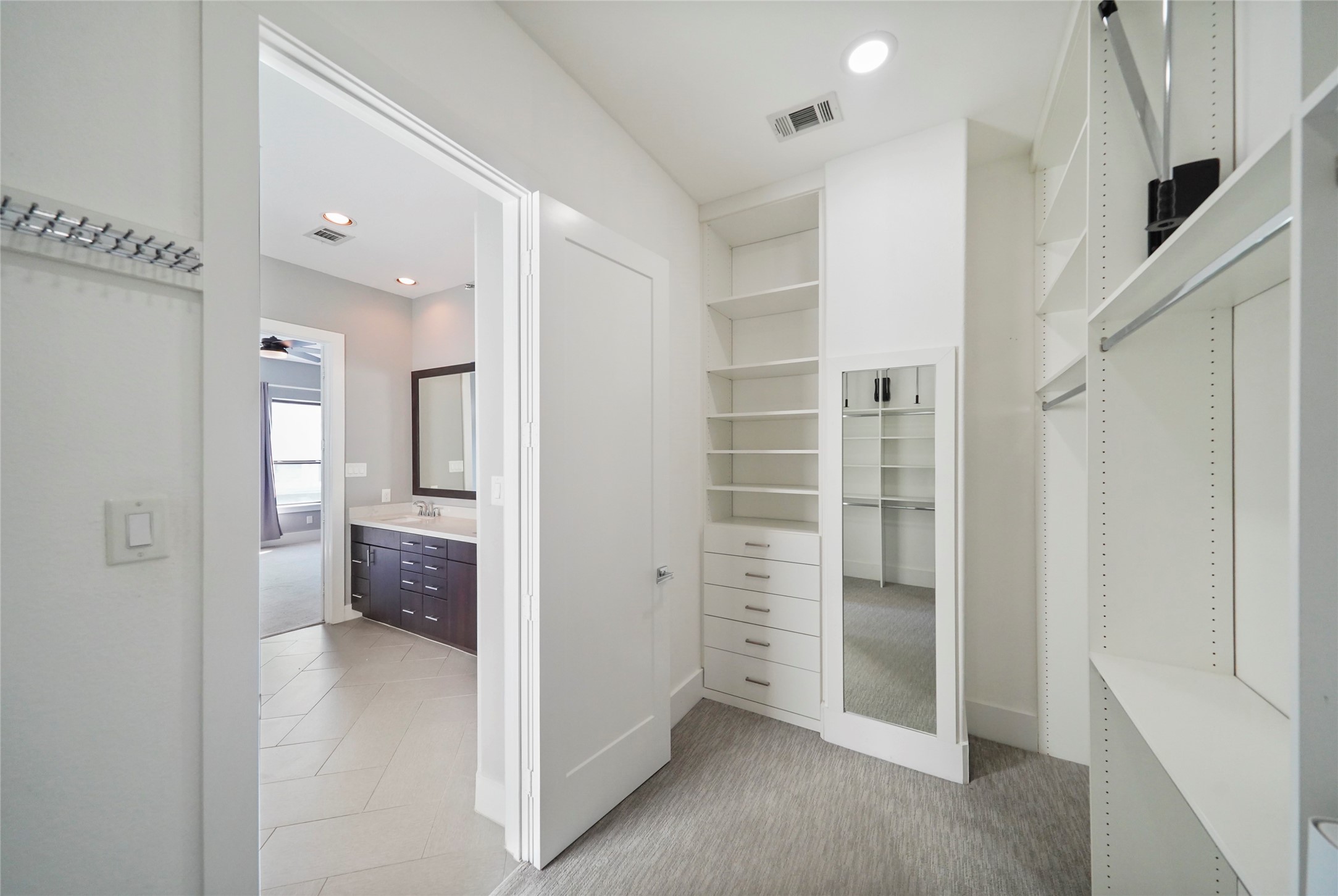 4123 Eigel Street Houston, TX 77007 - Photo 17 of 25 a view of walk in closet with white walls