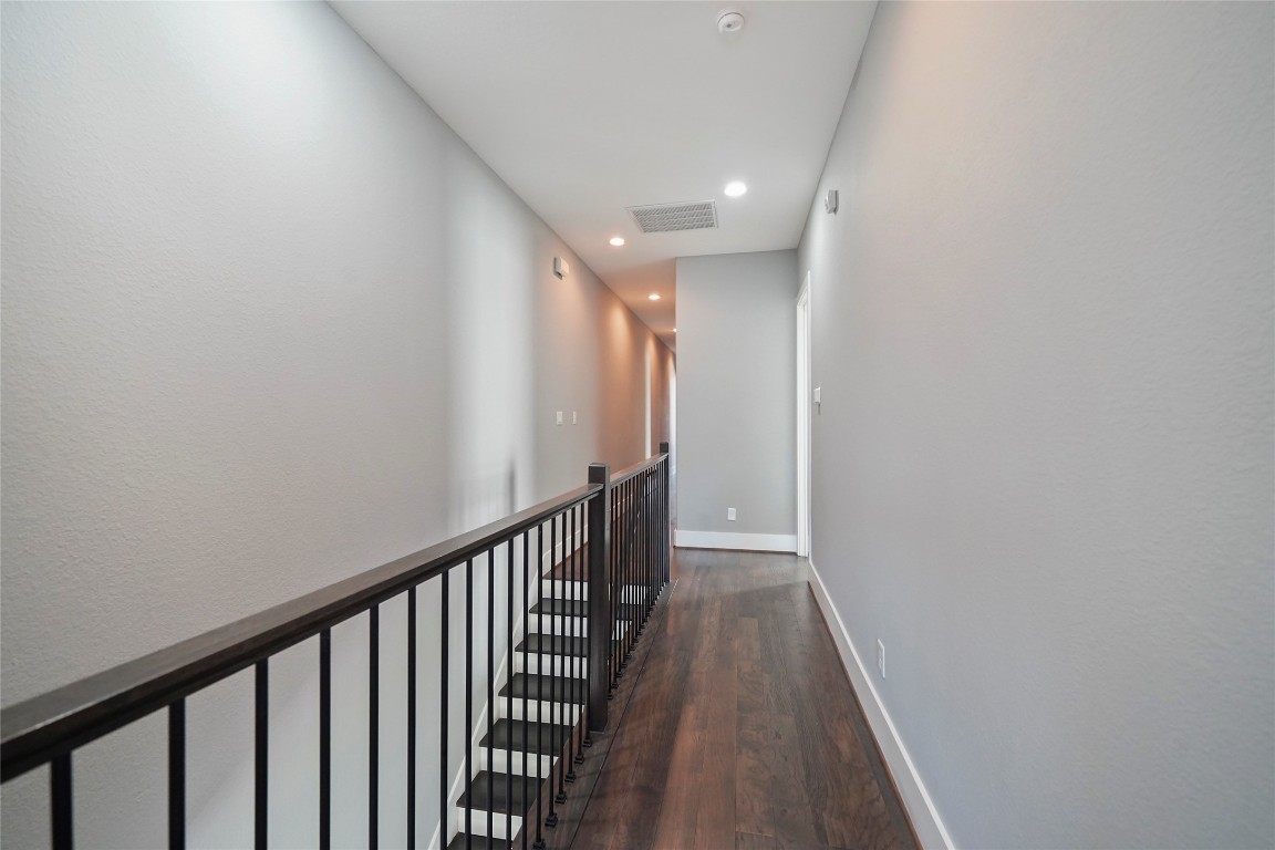 4123 Eigel Street Houston, TX 77007 - Photo 20 of 25 a view of hallway with wooden floor